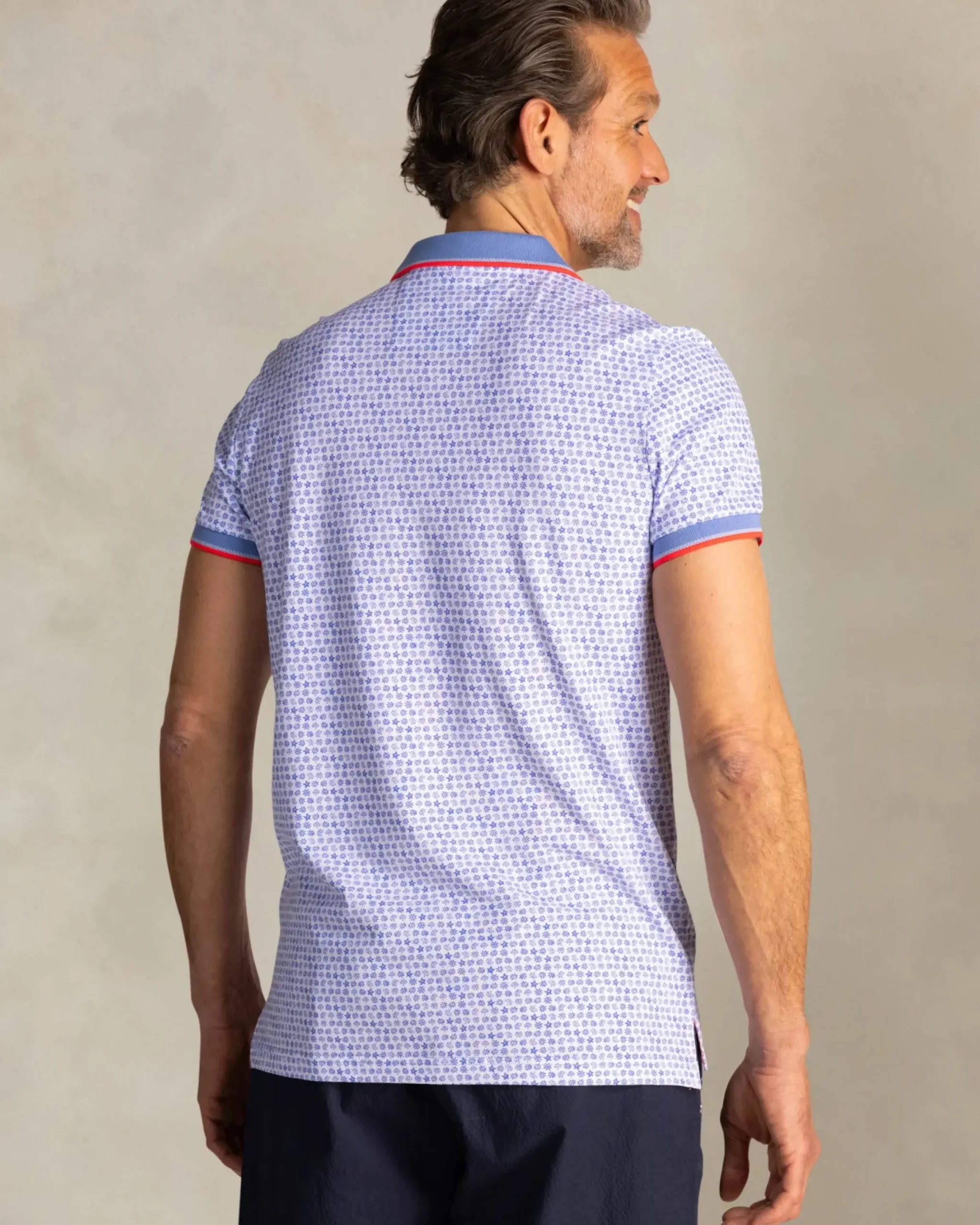 Blauwe katoenen polo met grafische print