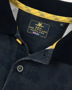 Donkerblauwe polo met bladprint