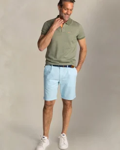 Effen groene polo met oranje details