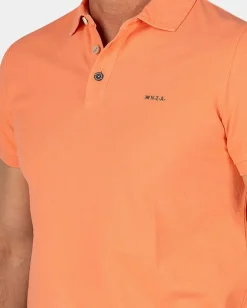 Effen katoenen koraalkleurige polo