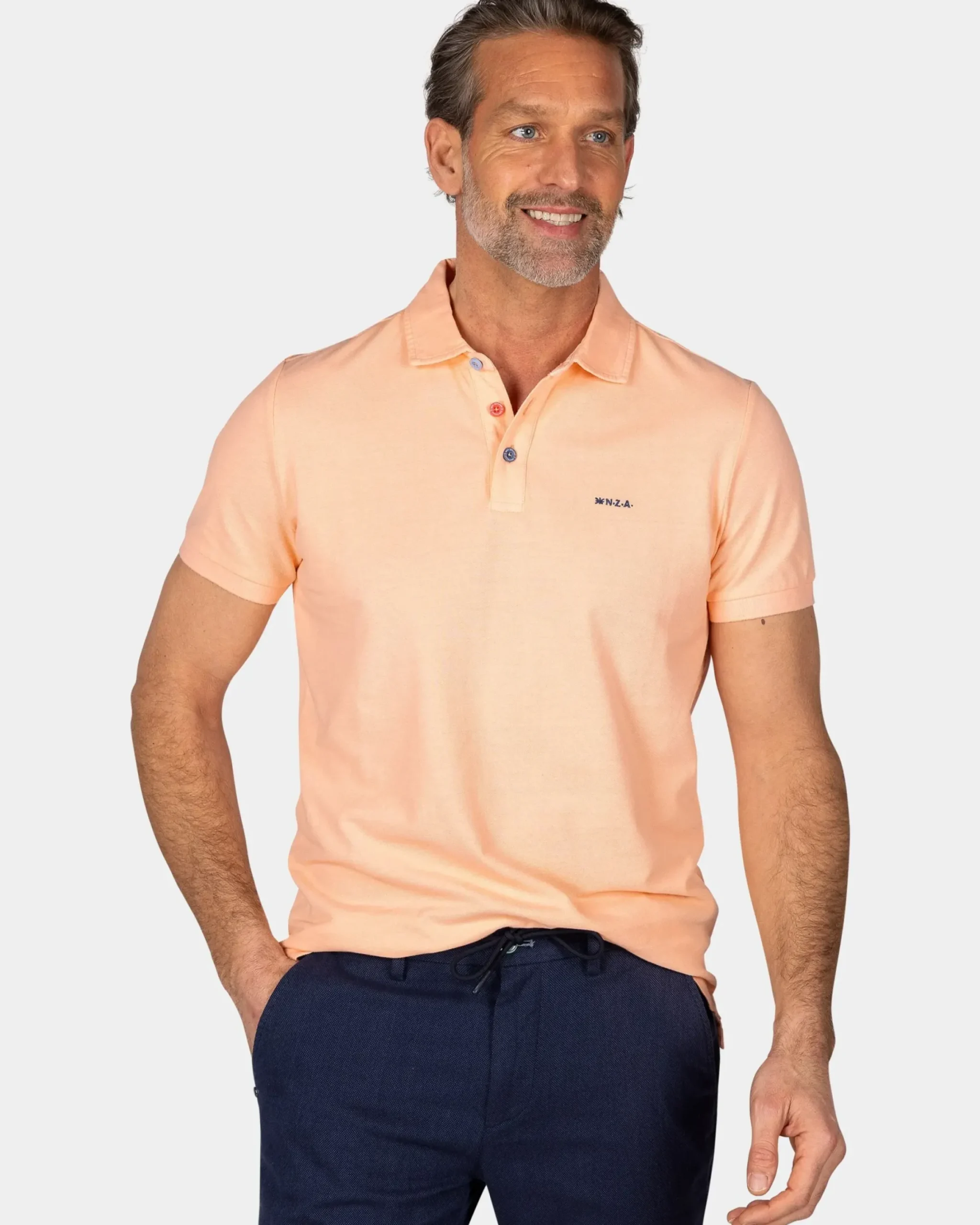 Effen katoenen lichtoranje polo