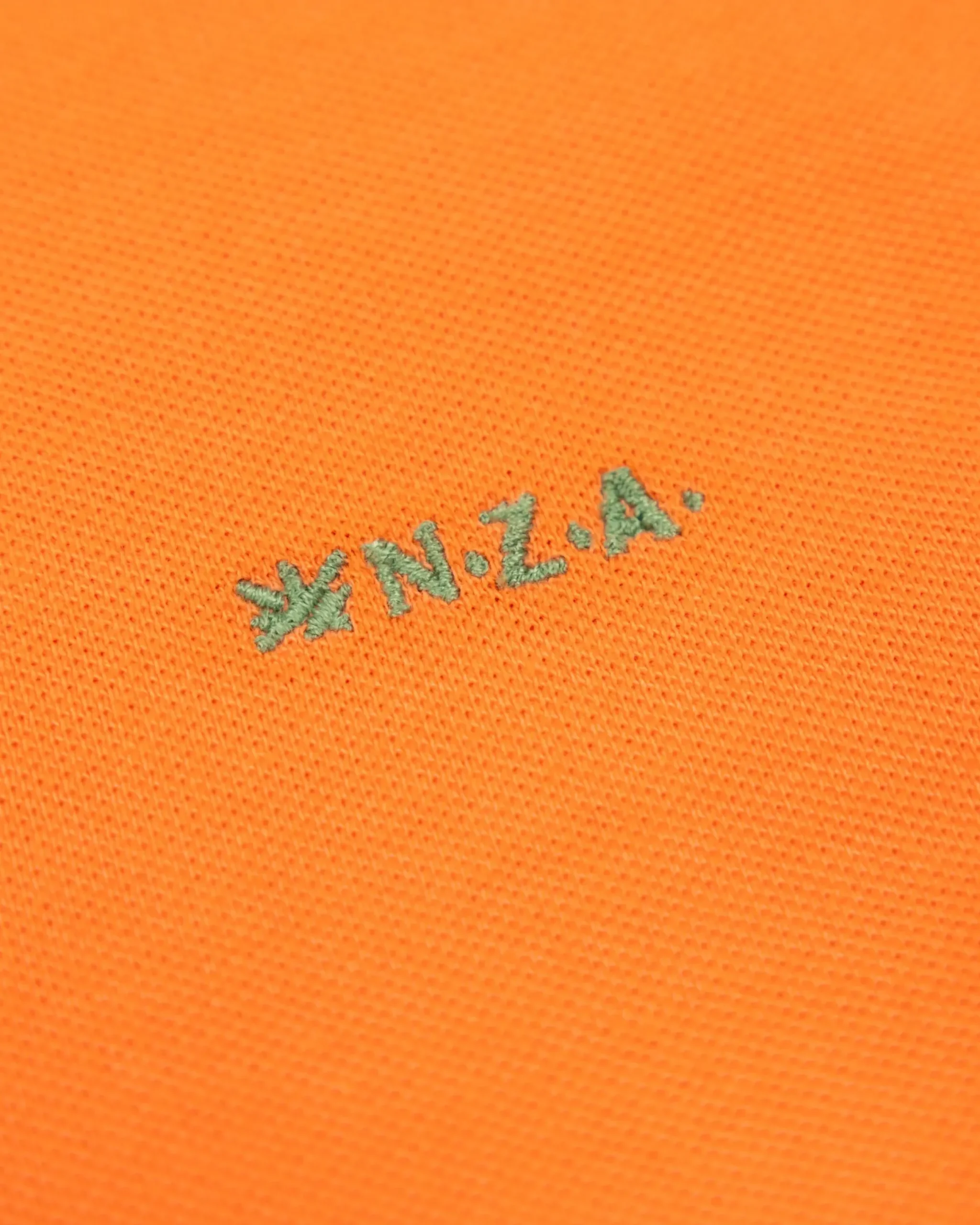 Effen katoenen oranje polo
