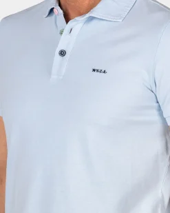 Effen katoenen pastelblauwe polo