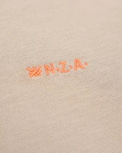 Effen katoenen zandkleurige polo