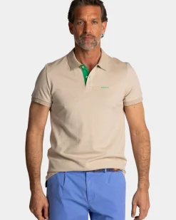 Effen lichtbruine polo met groene details