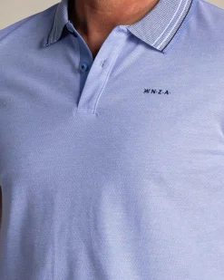 Felblauwe polo met gestreepte kraag