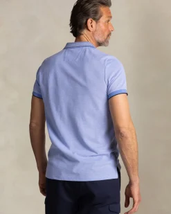 Felblauwe polo met gestreepte kraag
