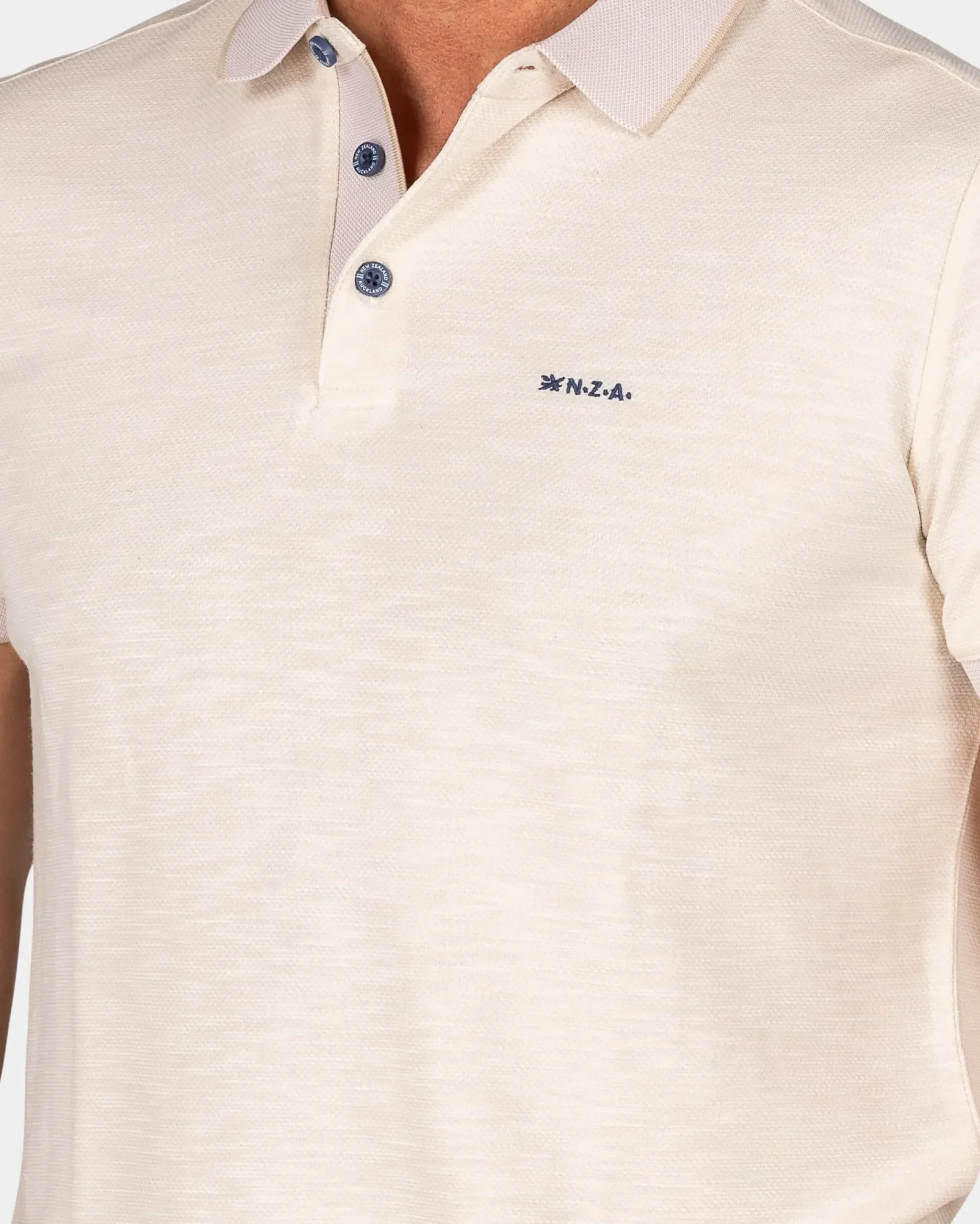 Lichtbeige polo met modaal