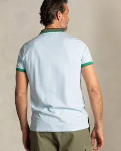 Lichtblauwe katoenen polo met groene kraag