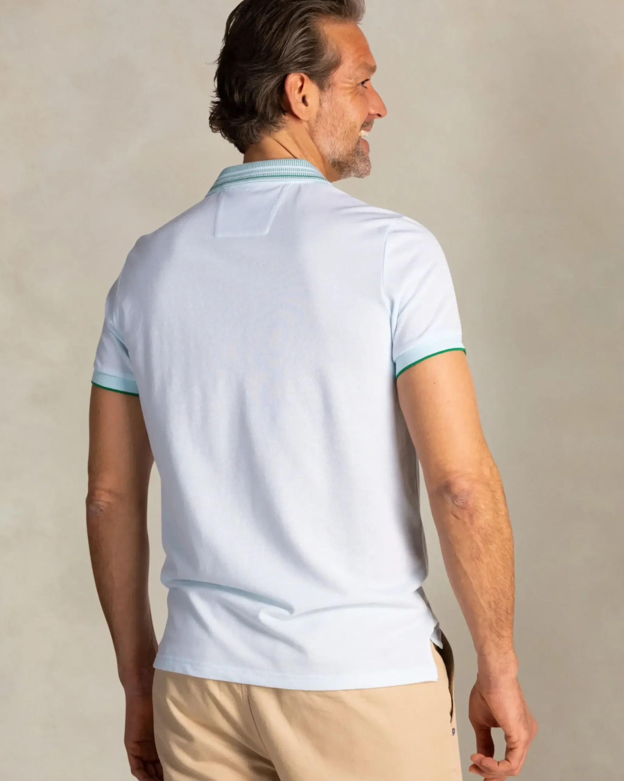 Lichtblauwe polo met gestreepte kraag