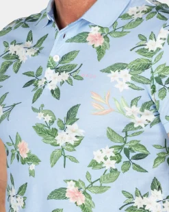 Pastelblauwe polo met grote bloemenprint